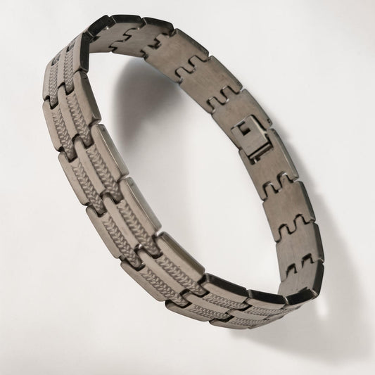 Aramat Jewels zilverkleurige stalen schakelarmband van 21cm met een fantasie schakelpatroon.