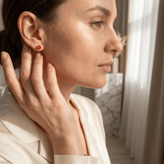 Zilverkleurige RVS Oorstekers Geboortesteen Juli - Rood/Oranje - 4 mm - Aramat Jewels - Oorbellen - cadeautip