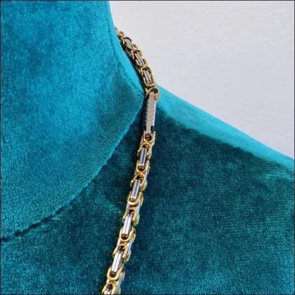 Koningsketting Goudkleurig Zilverkleurig Chirurgisch Staal 4mm 60cm 8720157030911 alles Aramat Jewels bicolor chirurgisch staal Geen edelsteen Geen_Parel Geen_steen goudkleurig halskettingen heren ket650-XN13871-60 Ketting zonder hanger konings nakijken PVD Schakelketting Staal Statement ketting tekst uniseks unisex Volwassenen zilverkleurig Zonder_hanger Zonder_steen