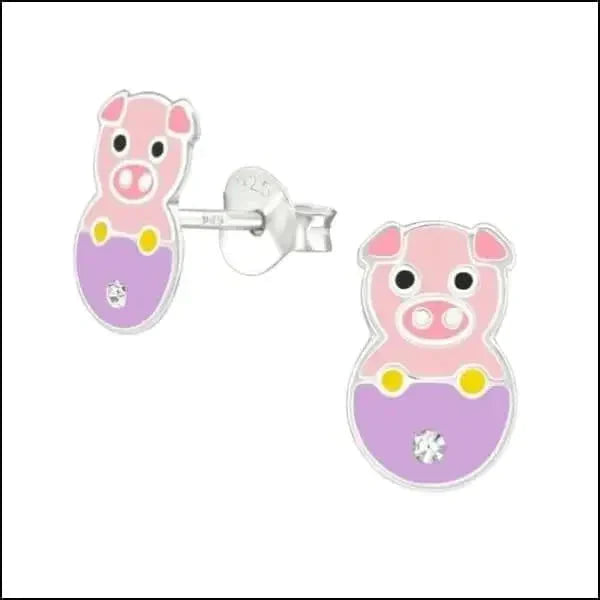a couple of pink and white clocks
