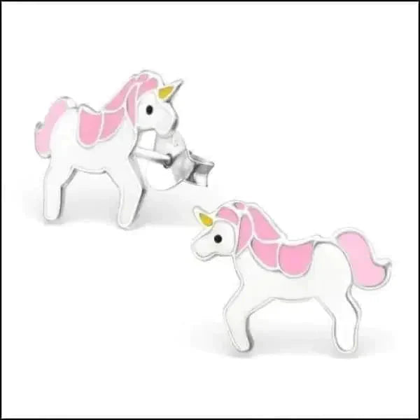 a couple of stuffed animals on a white surface