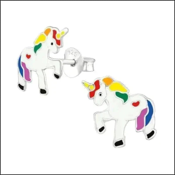 a group of stuffed animals on a white surface