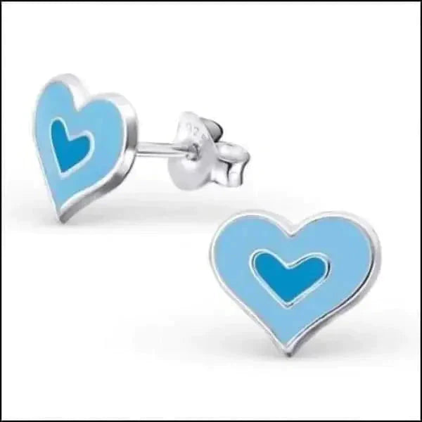 a pair of blue scissors sitting on a table