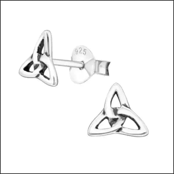 a pair of scissors sitting on top of a table