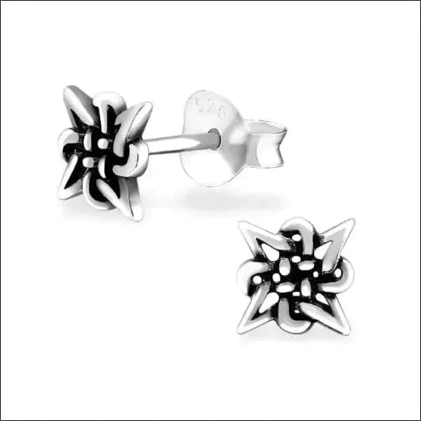 a black and white photo of some flowers