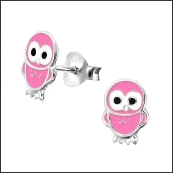 a pink stuffed animal with a pink <unk>