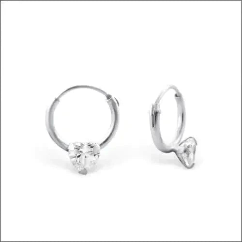 a pair of scissors on a white surface