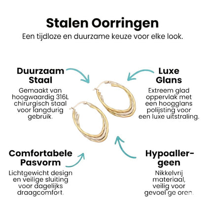 Aramat Jewels bicolor oval hoop earrings with twisted gold and silver stainless steel, 38x6mm, featuring a triple ring design and hinge closure.