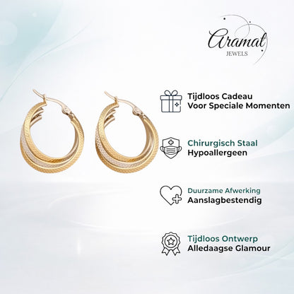 Aramat Jewels bicolor triple hoop earrings with a diamond-cut pattern in gold and silver stainless steel, 35mm diameter.