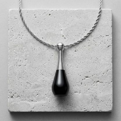 Aramat Jewels black and silver cone-shaped cremation urn pendant necklace made of 316L stainless steel, 4cm long, with a rope chain.
