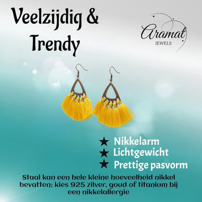 Aramat Jewels boho oorhangers met gele kwastjes en bronskleurig metaal, ideaal voor een zomerse festival look.