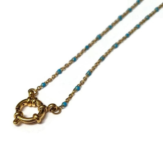 Aramat Jewels gold-tone stainless steel necklace with blue enamel beads and a toggle clasp.