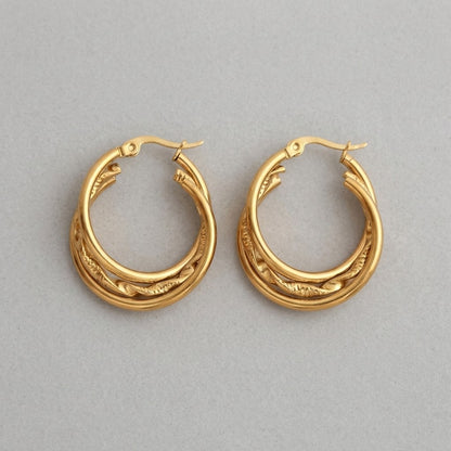 Aramat Jewels gold-tone stainless steel 3-layer hoop earrings with braided detail, 25mm diameter.