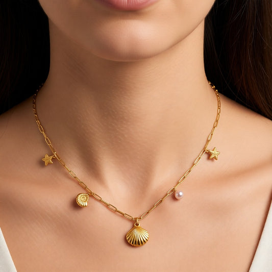 Aramat Jewels gold-tone link chain necklace with pearl, shell, starfish, and seashell charms.