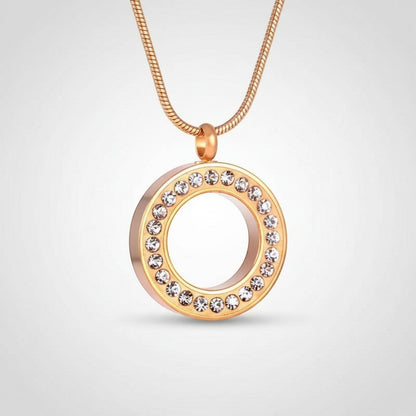 Aramat Jewels® gouden cirkel ashanger met kristallen, gemaakt van roestvrij staal. Gedenksieraad zonder ketting.
