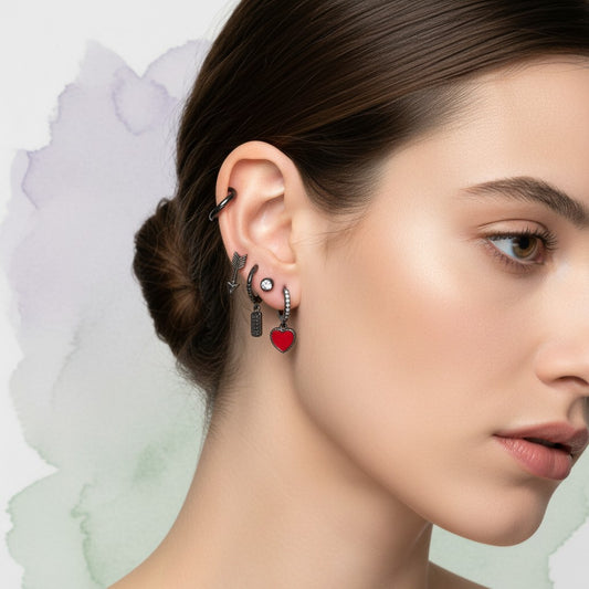 Aramat Jewels set of 6 grey hoop earrings with charms: heart, smiley, arrow, bar, and cubic zirconia.