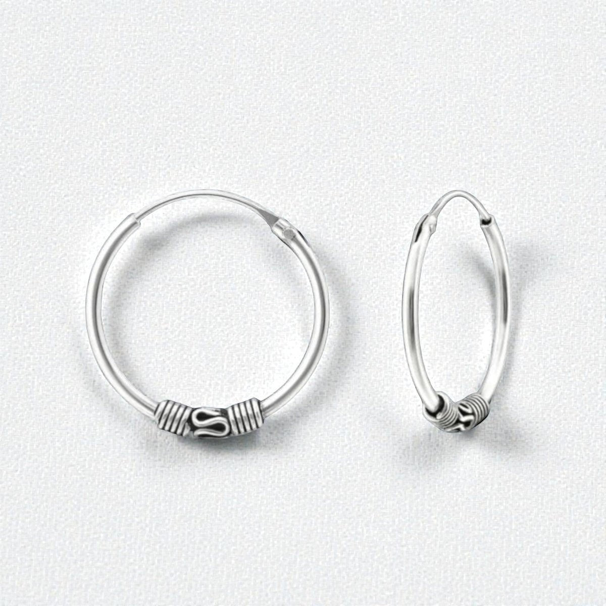 Aramat Jewels 18mm oxidized silver Bali hoop earrings with intricate detailing, perfect for festival or everyday wear.