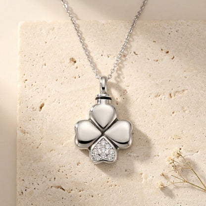 Aramat Jewels silver-tone stainless steel four-leaf clover cremation pendant with clear cubic zirconia detail.