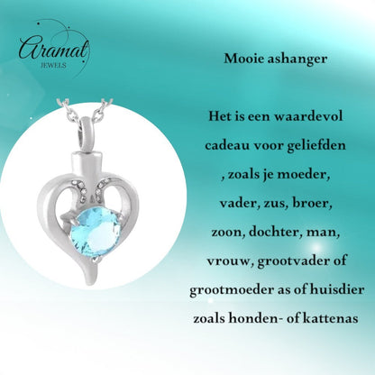 Aramat Jewels silver-tone stainless steel heart-shaped cremation urn pendant with a blue zirconia and small clear crystals.