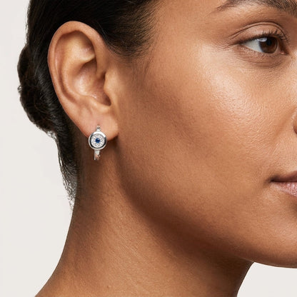 Aramat Jewels silver hoop earrings with blue and clear cubic zirconia, 12mm diameter.