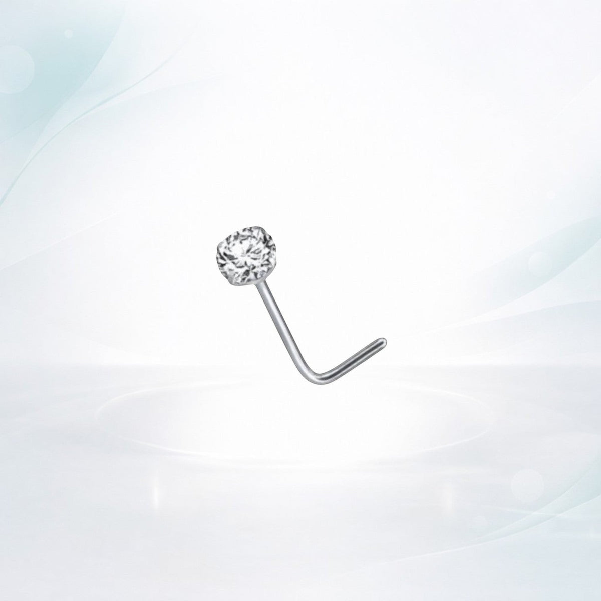 Aramat Jewels silver steel L-shaped nose piercing with a clear cubic zirconia stone.
