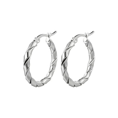 Aramat Jewels silver-tone stainless steel twisted hoop earrings, 45mm. Modern, trendy design for women.