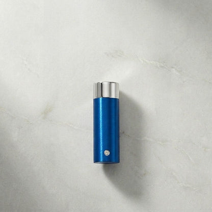 Aramat Jewels stalen blauwe ashanger met schroefdop en een klein kristal aan de onderkant, zonder ketting.