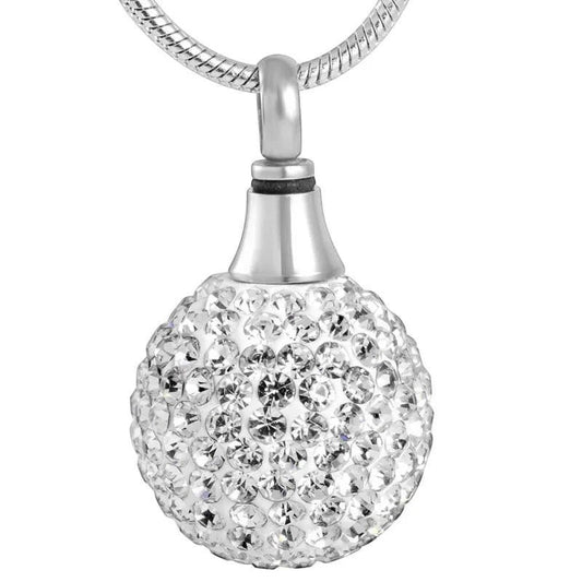 Aramat Jewels zilverkleurige bolvormige ashanger bezet met kristallen, met schroefsluiting. Discreet gedenksieraad zonder ketting.