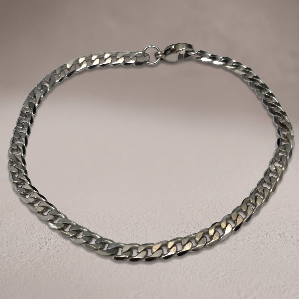 Aramat Jewels zilverkleurige stalen gourmet armband van 19cm en 4mm breed met een schakelsluiting.
