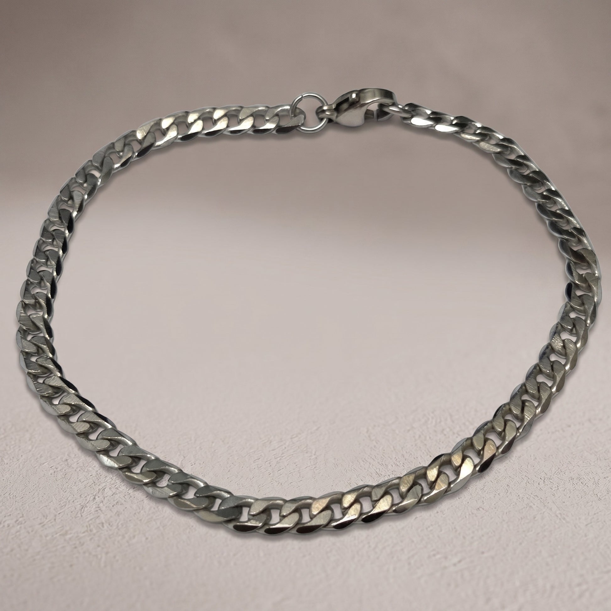 Aramat Jewels zilverkleurige stalen gourmet armband van 19cm en 4mm breed met een schakelsluiting.
