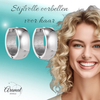 Aramat Jewels silver-coloured stainless steel hoop earrings, 13mm diameter, polished finish, unisex design.