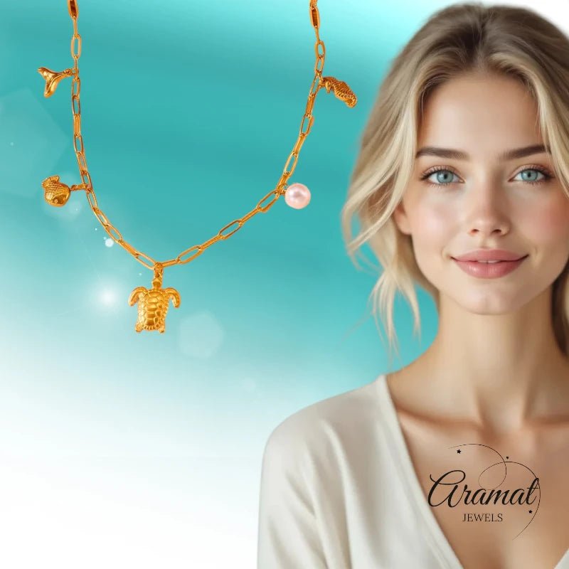 Goudkleurige damesketting met parel & zee - bedels – 45 cm - ket1174 - 511141 - Halskettingen kopen# - 45cm - alles - Bedelketting