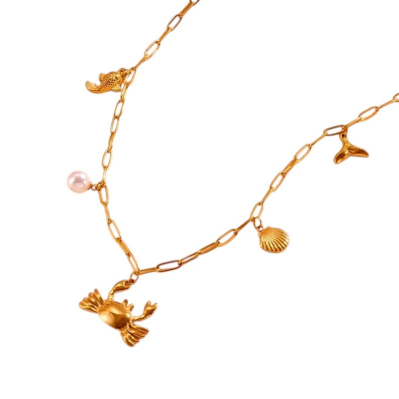 Goudkleurige damesketting met zee - bedels – 45 cm - ket1168 - 511144 - Halskettingen kopen# - 45cm - alles - Bedelketting