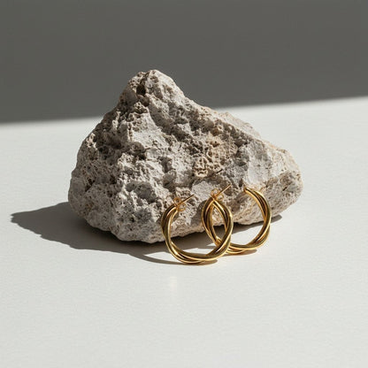Goudkleurige Gedraaide Halve Oorringen 30x4mm RVS - Aramat Jewels - Oorbellen - cadeautip