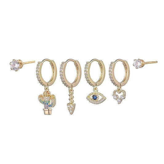 Een set van vijf gouden hoepeloorbellen met verschillende gekleurde stenen