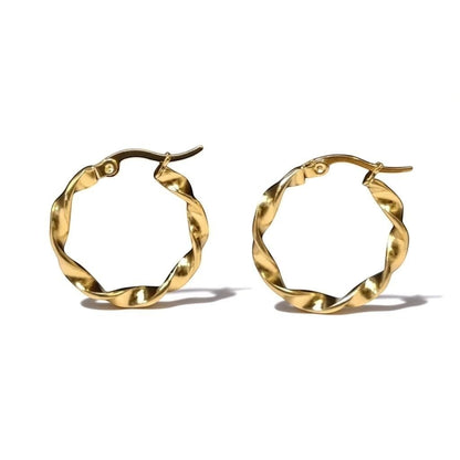 Goudkleurige RVS Wokkeloorringen Gedraaid - 20 mm - Aramat Jewels - Oorringen - cadeautip