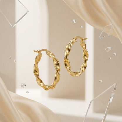 Goudkleurige RVS Wokkeloorringen Gedraaid - 20 mm - Aramat Jewels - Oorringen - cadeautip