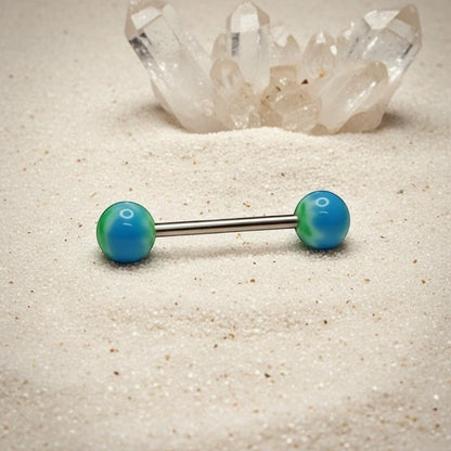 Aramat Jewels blue and green weed leaf tongue piercing made of surgical steel with marbled effect balls.
