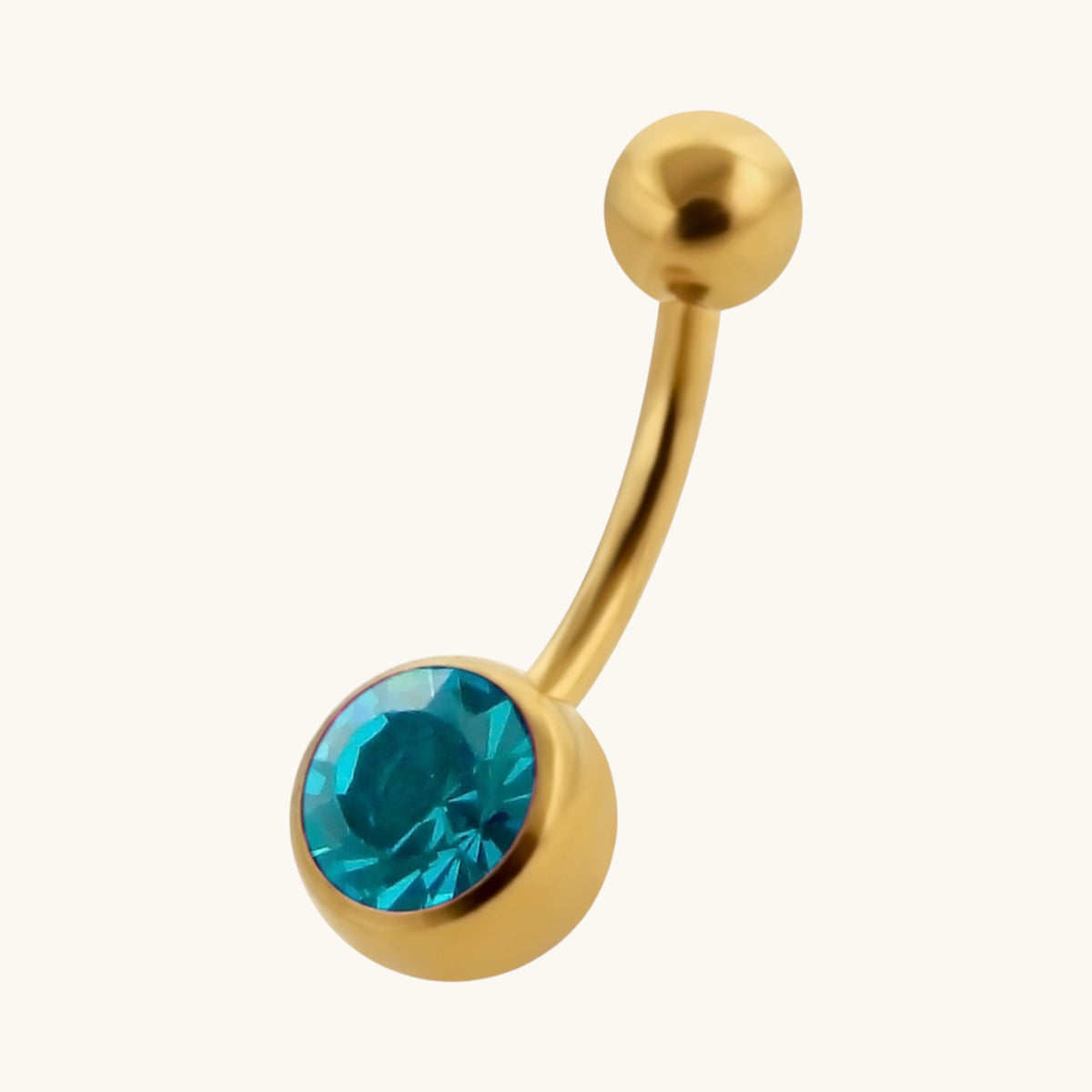 Piercing au nombril avec pierre de zircone couleur or