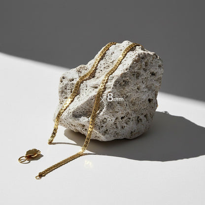 Platte Gourmet Ketting met bewerkte rand 8mm Goudkleurig Staal - Aramat Jewels - Halskettingen - cadeautip