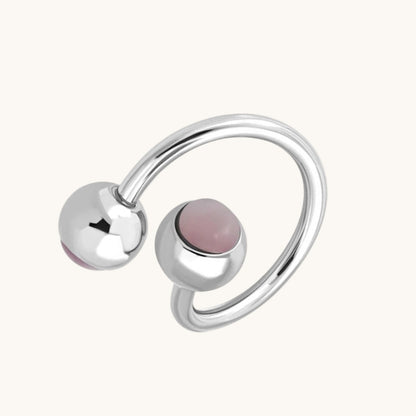 Roze Cat Eye Stalen Spiraal navelPiercing