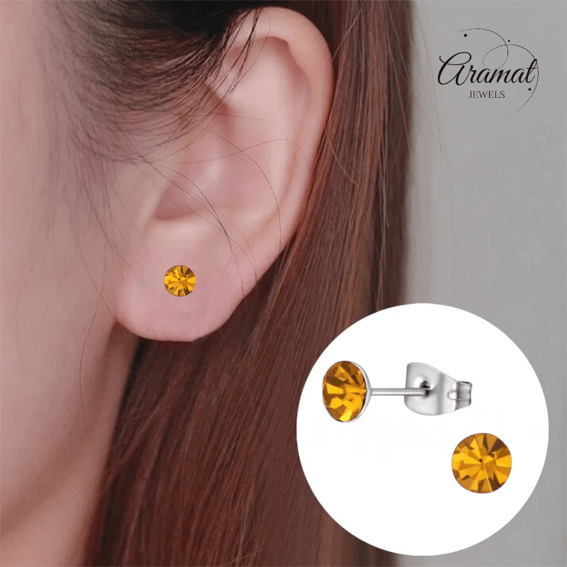 Stalen Kristal Oorbellen met topaas oranje steentje – Zilverkleur – 5mm - Aramat Jewels - Oorbellen - cadeautip