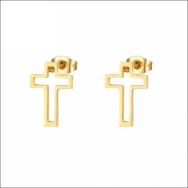 Een paar gouden oorbellen met een kruisontwerp