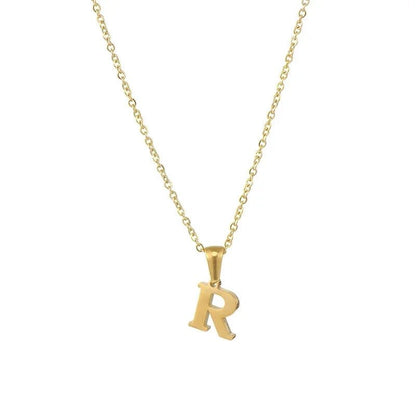 Goudkleurige letter ’R’ hanger aan een delicate ketting.