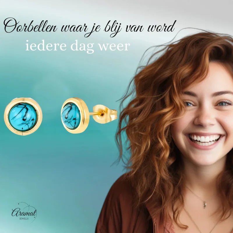 Turquoise en gouden oorbellen.