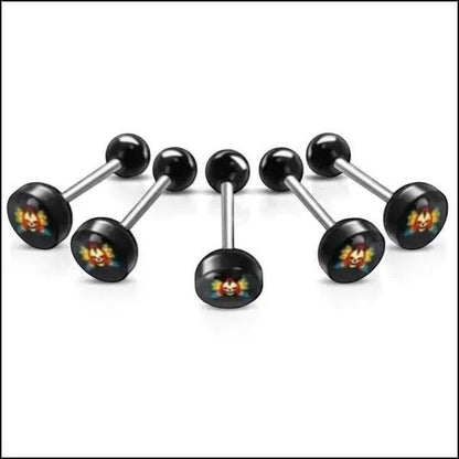 Aramat Jewels black surgical steel tongue piercing with a colorful clown skull acrylic logo.