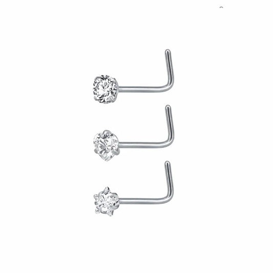 Drie paar neusringen met hokjes erop