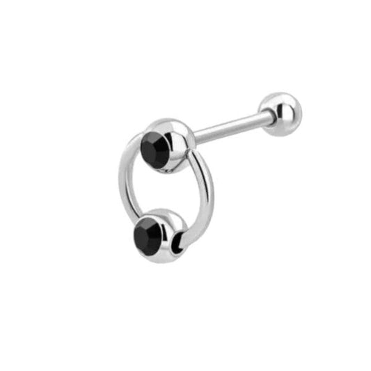 Een set van vier zwart-witte piercings