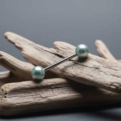 Aramat Jewels light blue pearl tongue piercing made of surgical steel. Elegant and chic design for healed piercings.