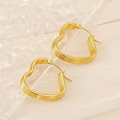 Triple Hart Oorringen Goudkleurig - Liefdevolle Statement - oor6283 - 827751 - Oorringen kopen# - 25mm - alles - cadeau